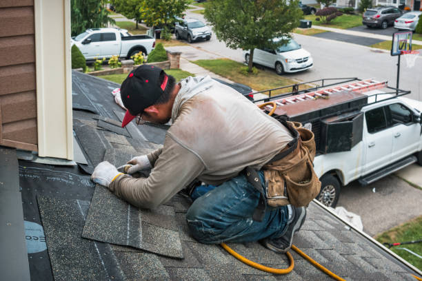 Professional Flat Roof Repair technician working in Belmont, TX